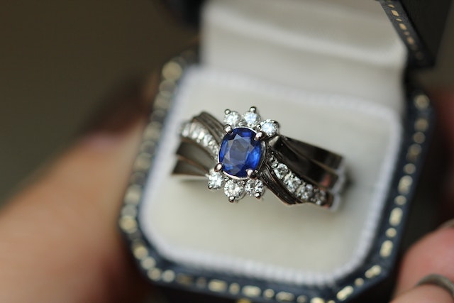 blue sapphire ring in a box